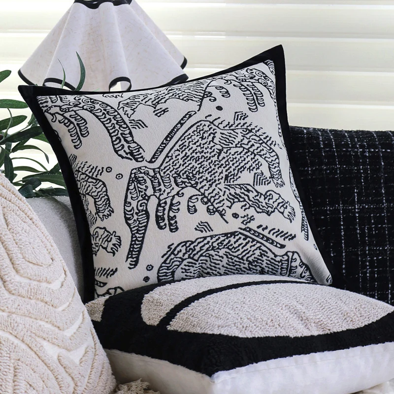 Square decorative cushion cover with hand-tufted geometric relief and corner tassels Stornfield