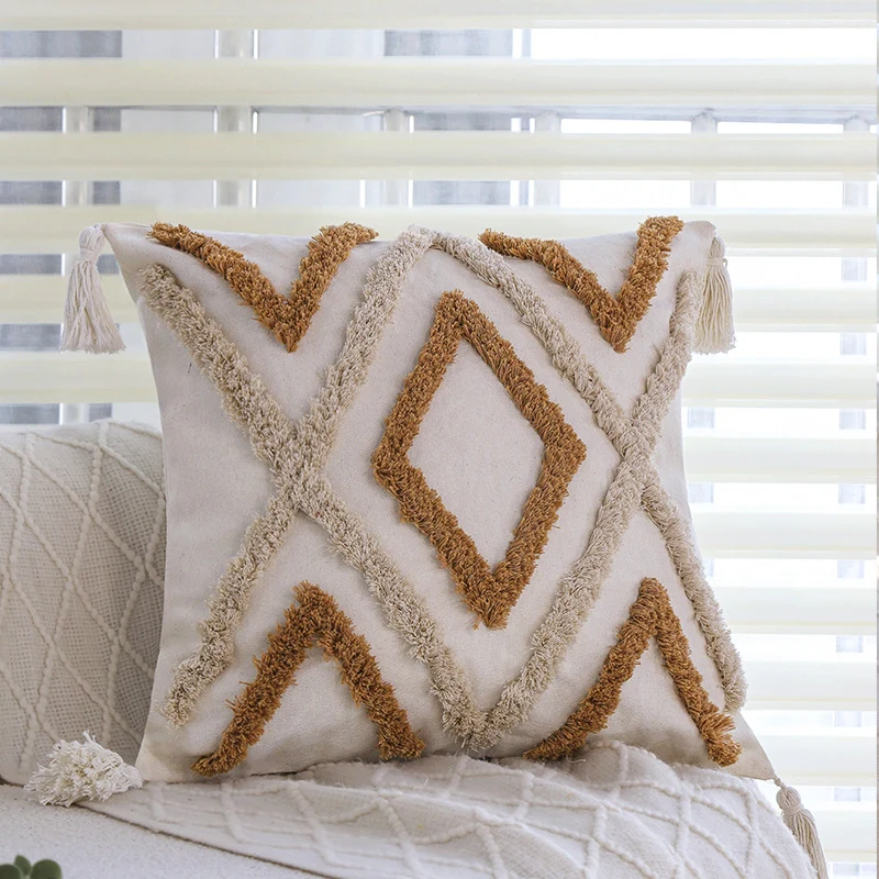 Square decorative cushion cover with hand-tufted diamond-loop relief, corner tassels, and cotton-linen mix Stornfield