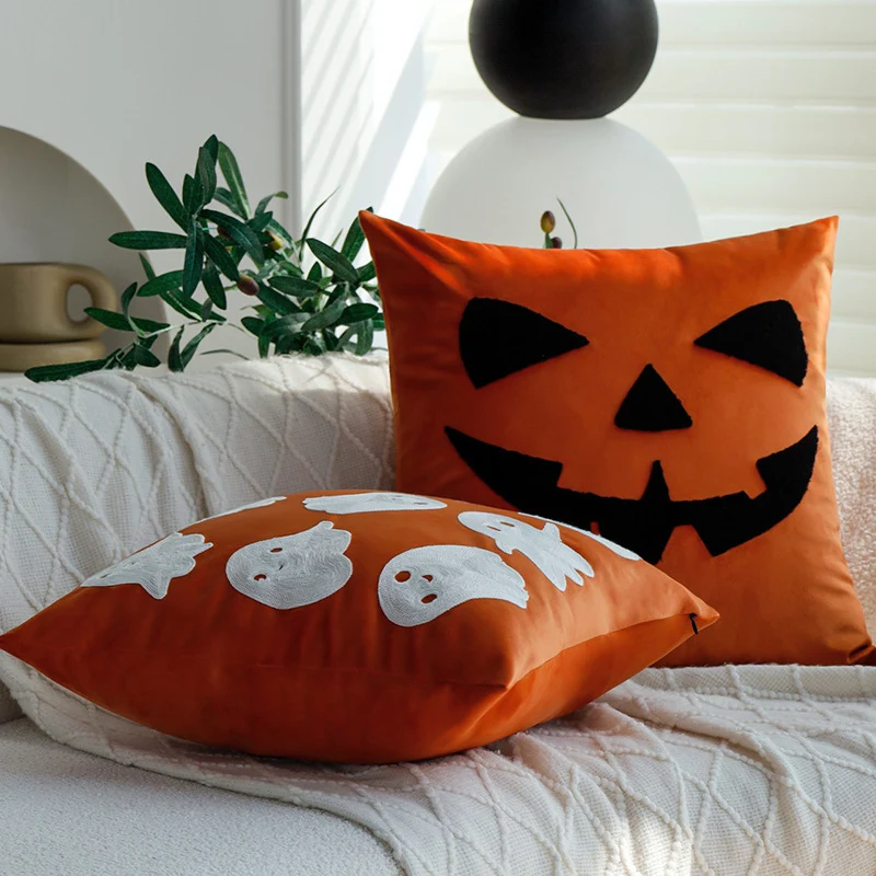 Square decorative cushion cover with Halloween pumpkin face tuft appliqué made of velvet Stornfield