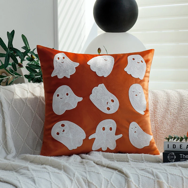 Square decorative cushion cover with Halloween pumpkin face tuft appliqué made of velvet Stornfield