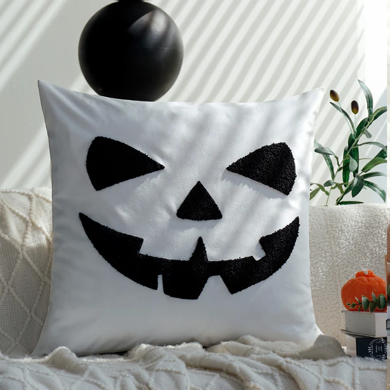 Square decorative cushion cover with Halloween pumpkin face tuft appliqué made of velvet Stornfield