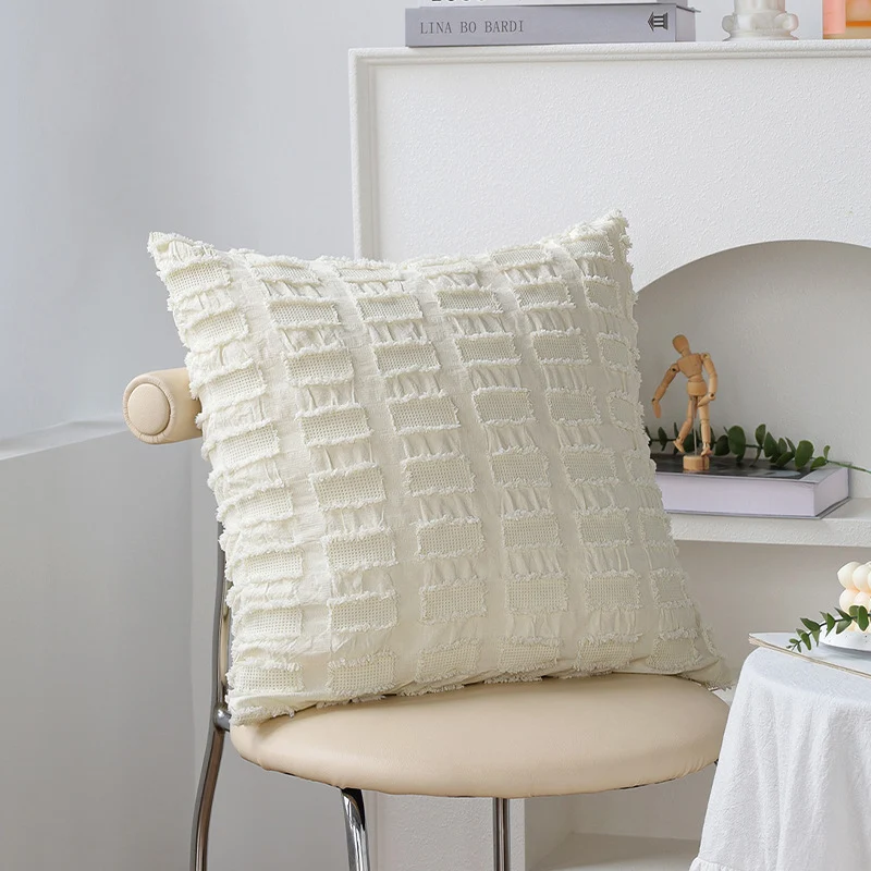Square decorative cushion cover with padded knots and woven checkered structure Stornfield