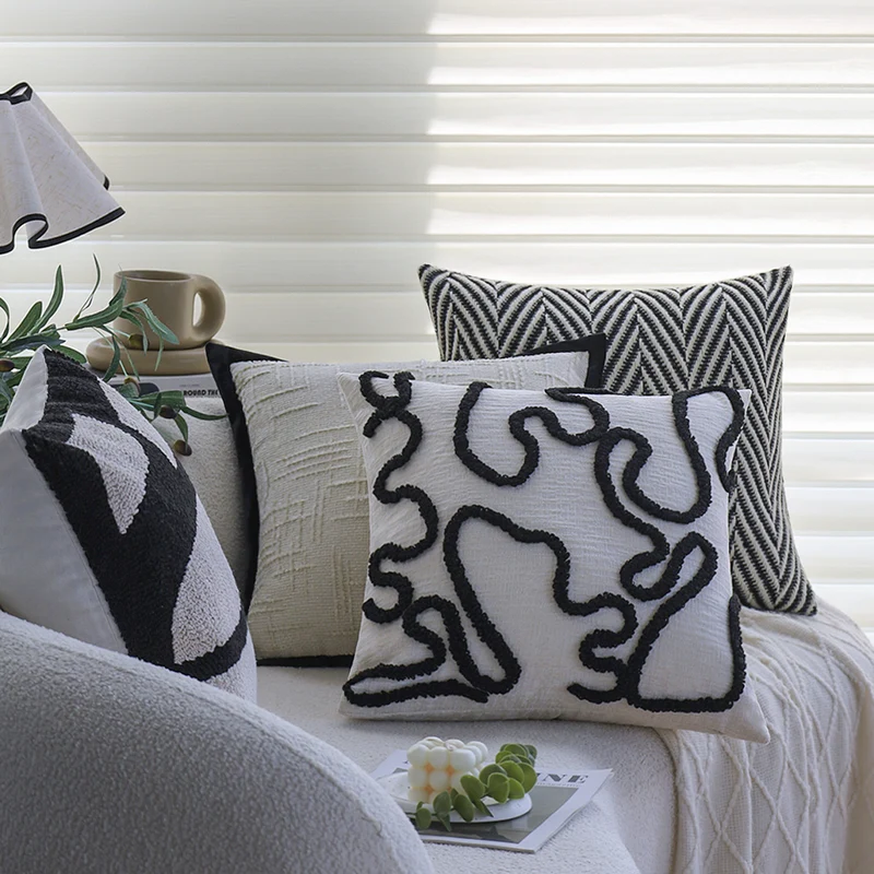 Square decorative cushion cover with geometric tufting and contrasting piping Stornfield