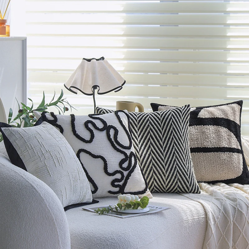 Square decorative cushion cover with geometric tufting and contrasting piping Stornfield