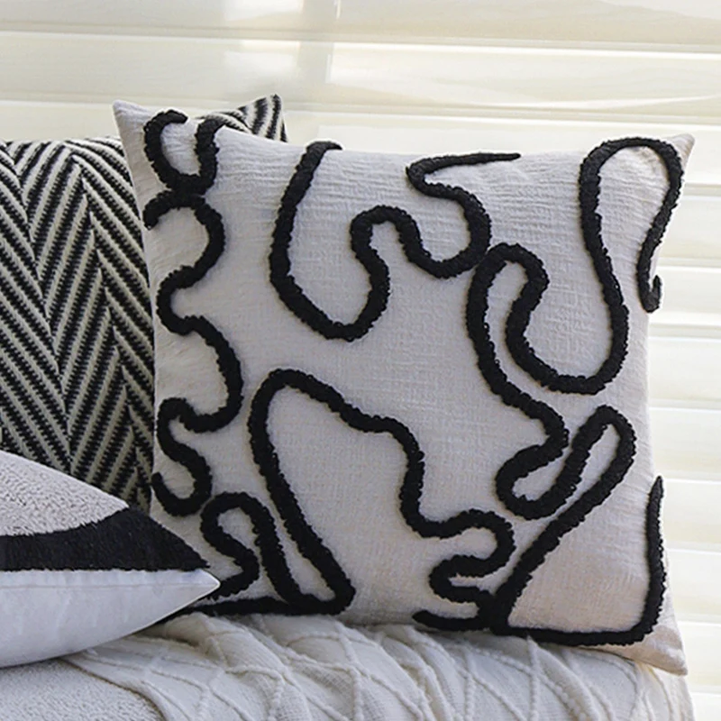 Square decorative cushion cover with geometric tufting and contrasting piping Stornfield