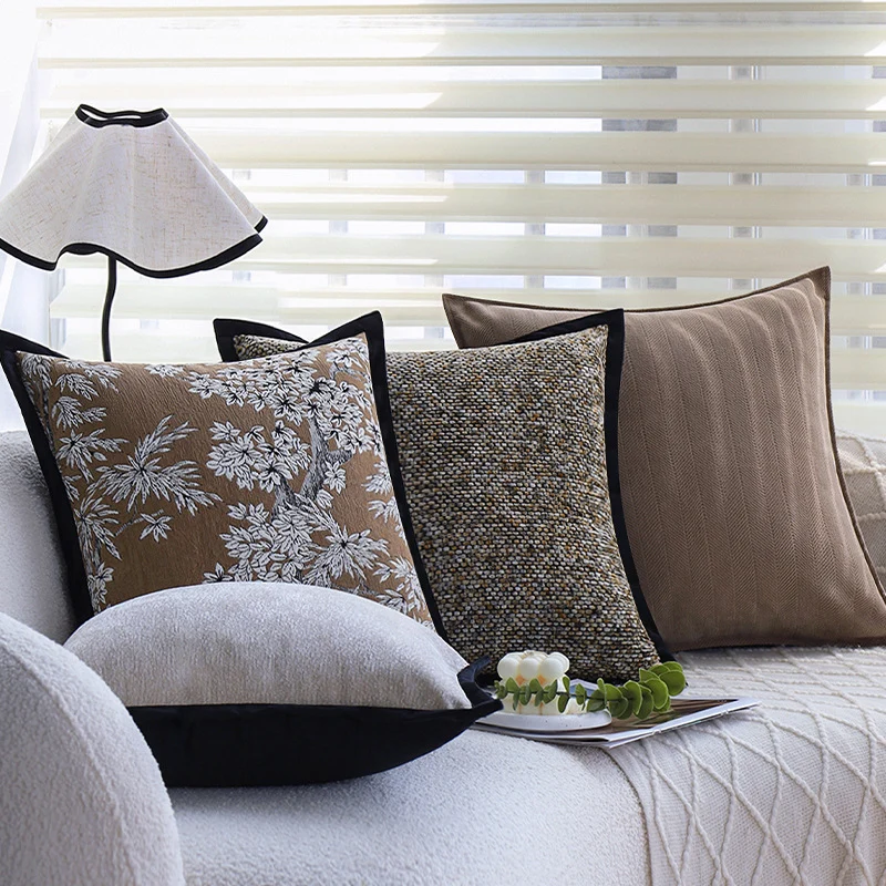Square decorative cushion cover with dense bouclé weave structure and contrasting piping Stornfield