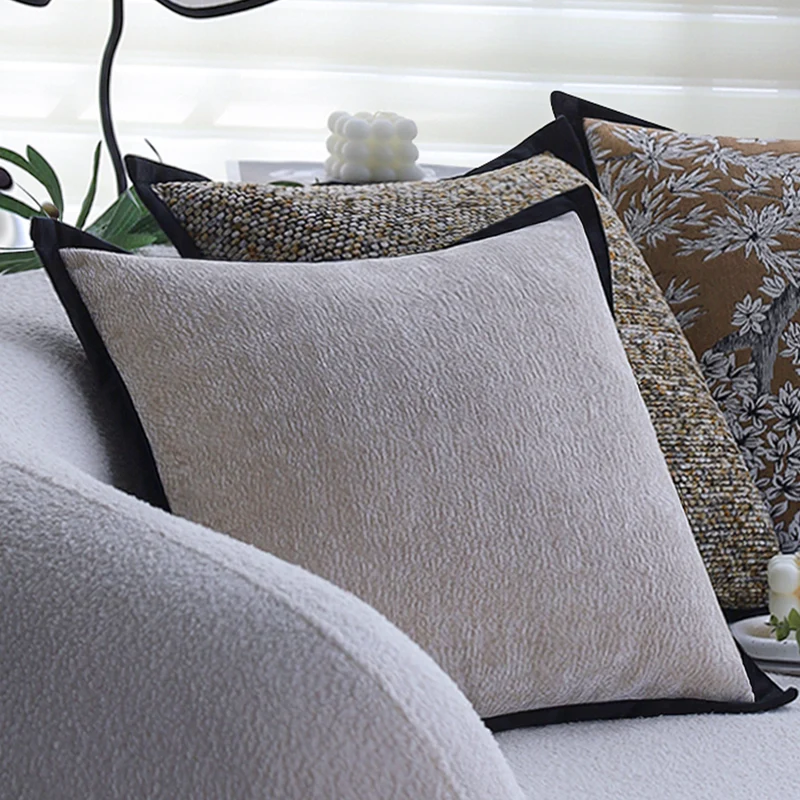 Square decorative cushion cover with dense bouclé weave structure and contrasting piping Stornfield