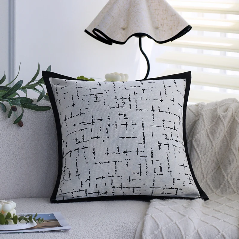 Square decorative pillowcase with abstract grid print and black piping Stornfield