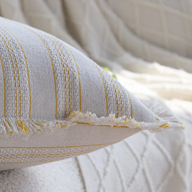 Square decorative cushion cover in linen-cotton blend with fine stripes and decorative fringed edge Stornfield