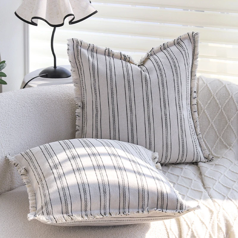 Square decorative cushion cover in linen-cotton blend with fine stripes and decorative fringed edge Stornfield