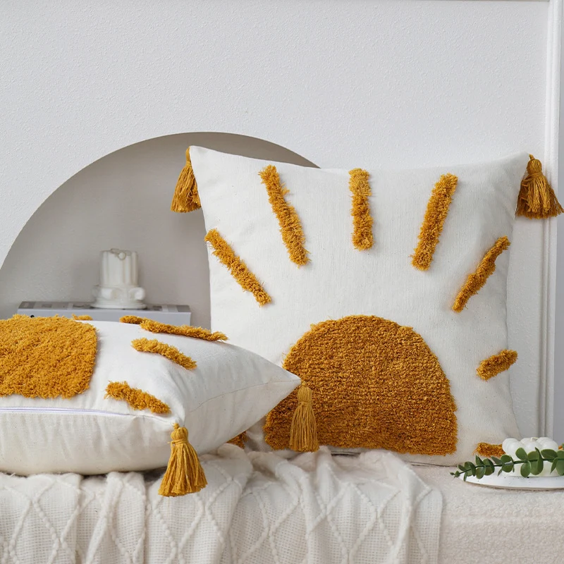 Decorative square cushion cover with hand-tufted sun relief, tassels, and cotton-linen blend Stornfield