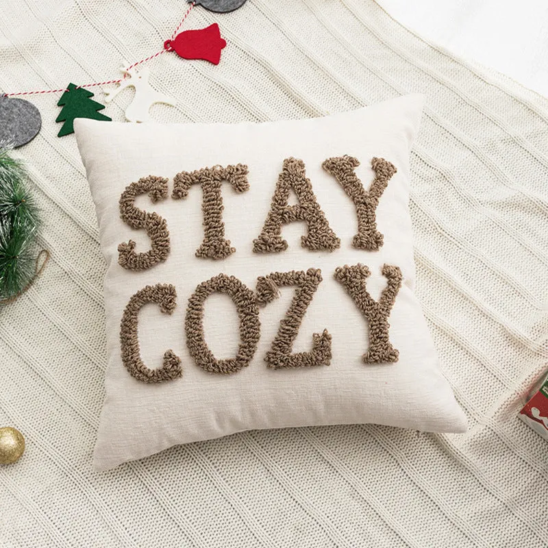 Decorative square cushion cover with hand-tufted lettering made of Bouclé Stornfield