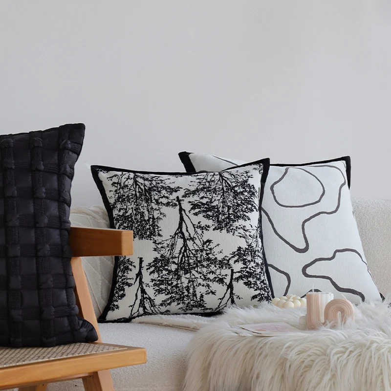 Decorative square cushion cover with abstract line print and contrasting piping Stornfield