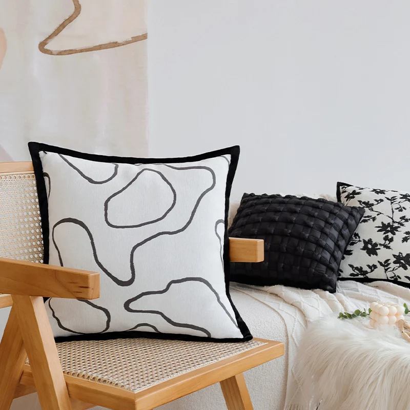 Decorative square cushion cover with abstract line print and contrasting piping Stornfield