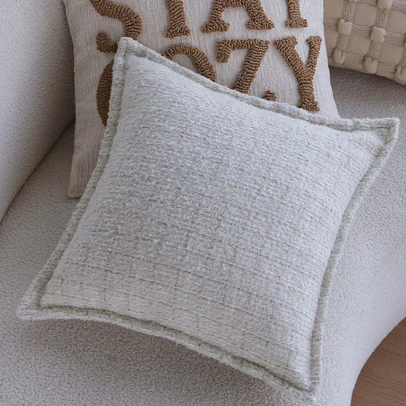 Decorative cushion cover with tufted lettering and textured cotton-linen blend Stornfield