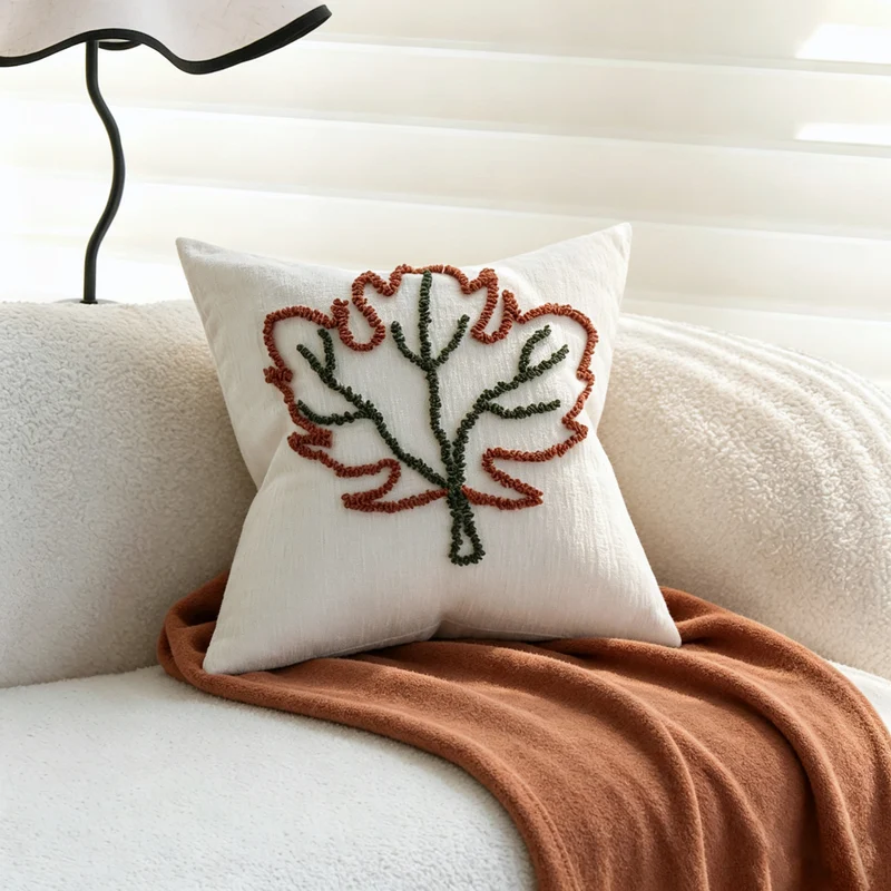 Decorative cushion cover with hand-tufted leaf design and fine cotton-linen blend Stornfield