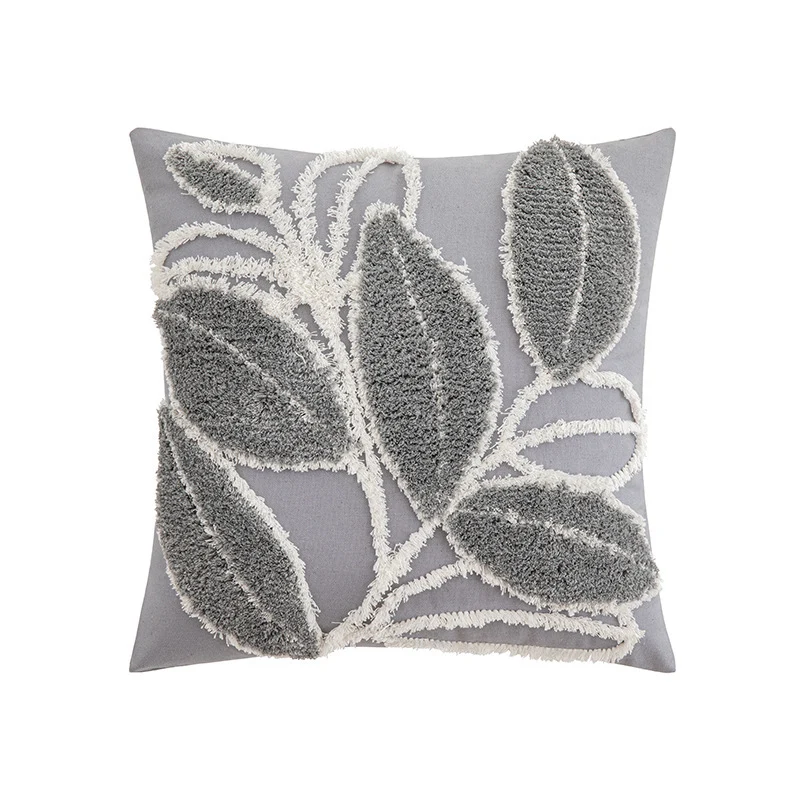 Decorative cushion cover with drawn leaf tufting and tassels Stornfield