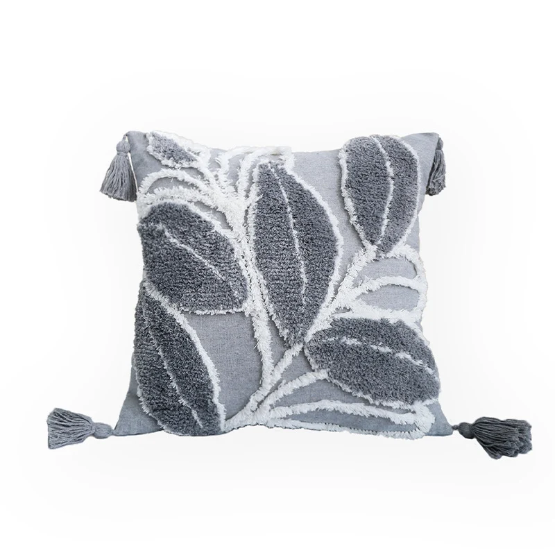 Decorative cushion cover with drawn leaf tufting and tassels Stornfield