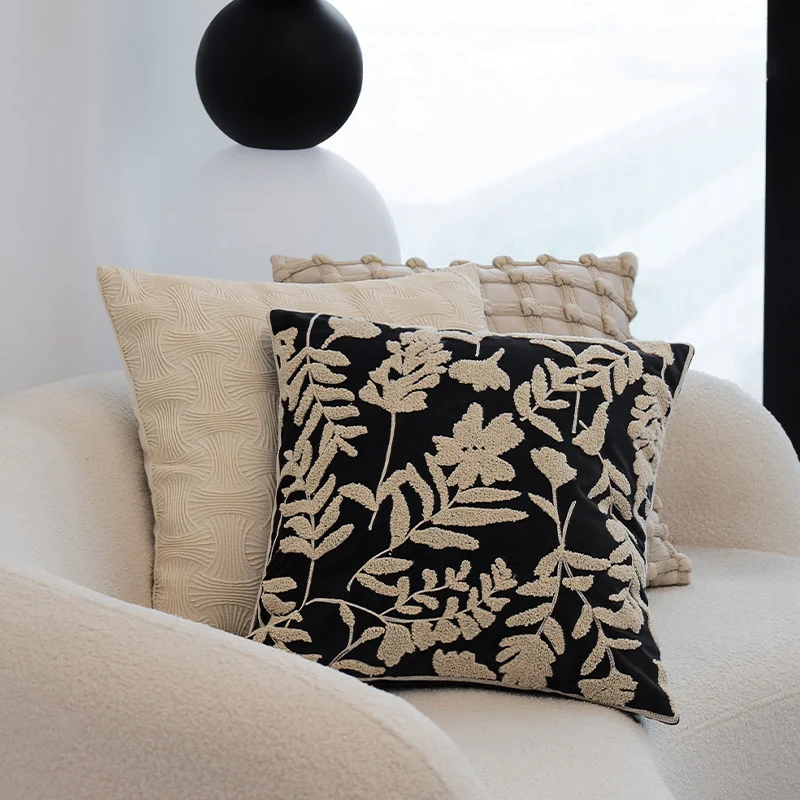 Decorative cushion cover with floral chenille tufting and velvet surface Stornfield