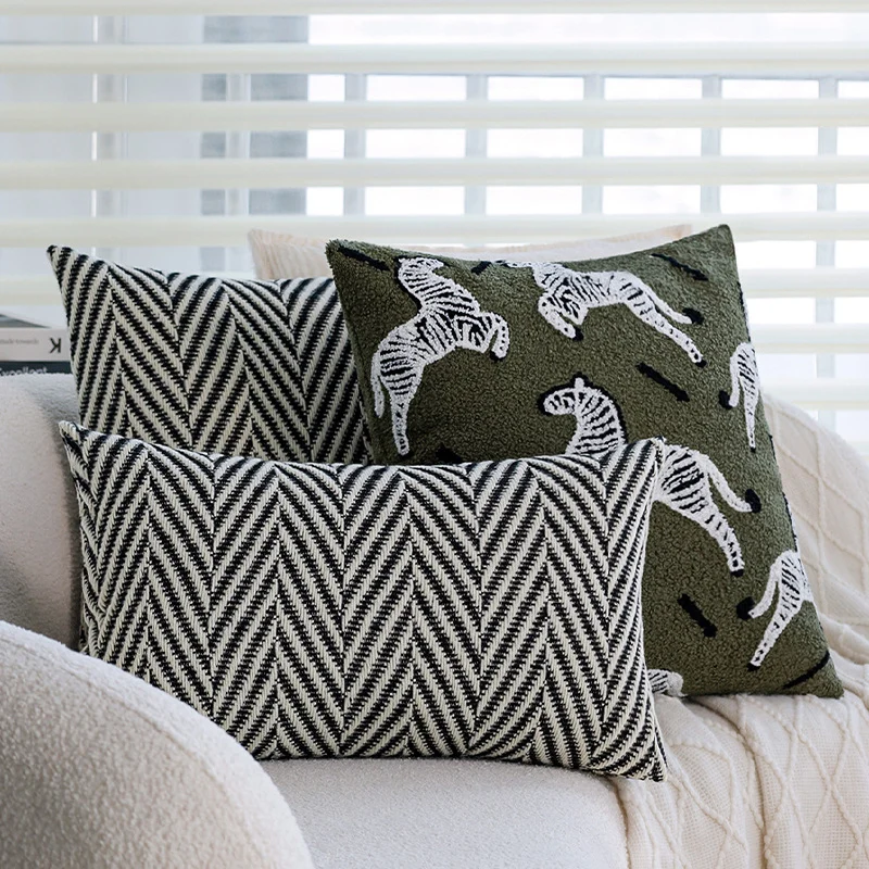 Decorative cushion cover with hand-tufted animal relief and soft boucle texture Stornfield