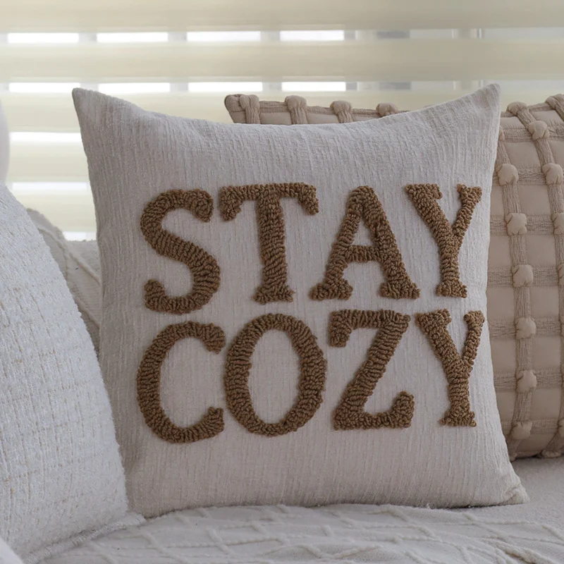 Soft rectangular decorative pillow made of faux fur with ribbed texture Stornfield