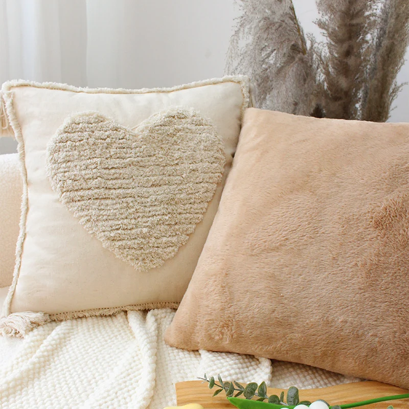 Soft square decorative cushion with embossed diamond pattern made of synthetic fur Stornfield
