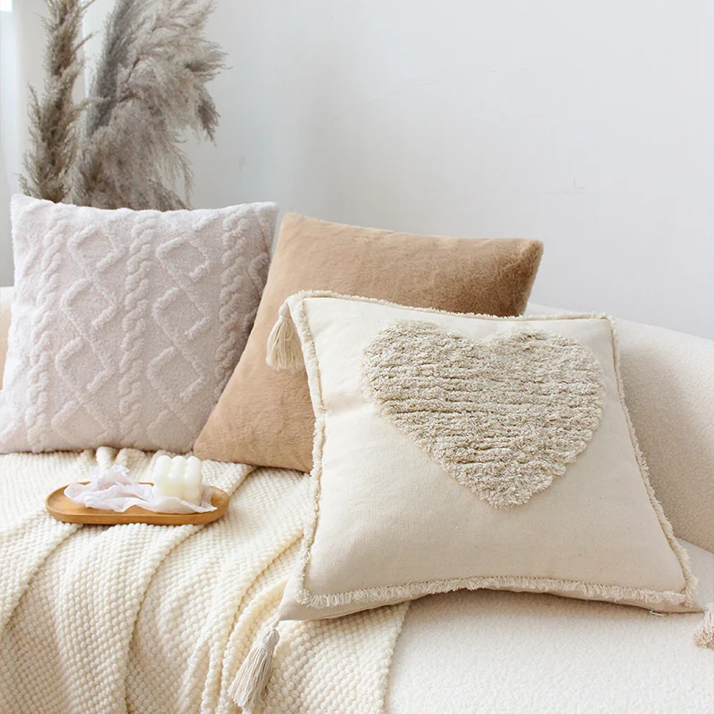 Soft square decorative cushion with embossed diamond pattern made of synthetic fur Stornfield