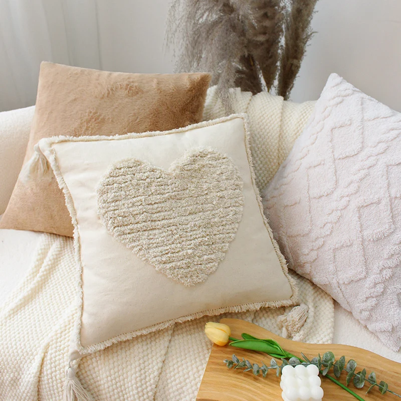 Soft square decorative cushion with embossed diamond pattern made of synthetic fur Stornfield