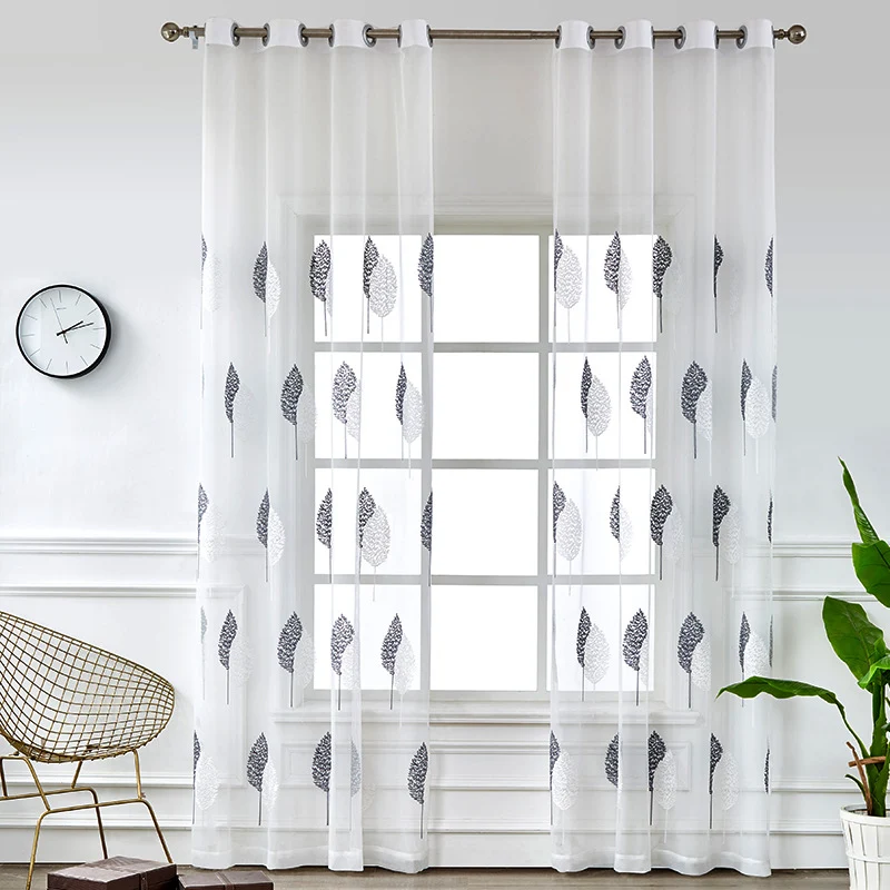 Transparent voile curtain with embroidered leaf pattern and eyelet suspension Stornfield