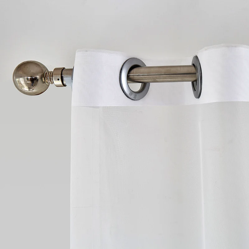 Transparent voile curtain with embroidered leaf pattern and eyelet suspension Stornfield