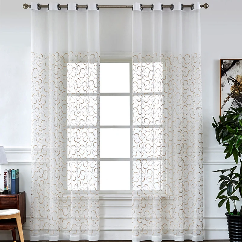 Transparent voile curtain with embroidered golden vine pattern Stornfield