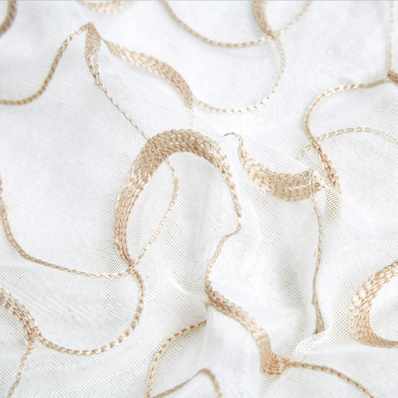 Transparent voile curtain with embroidered golden vine pattern Stornfield