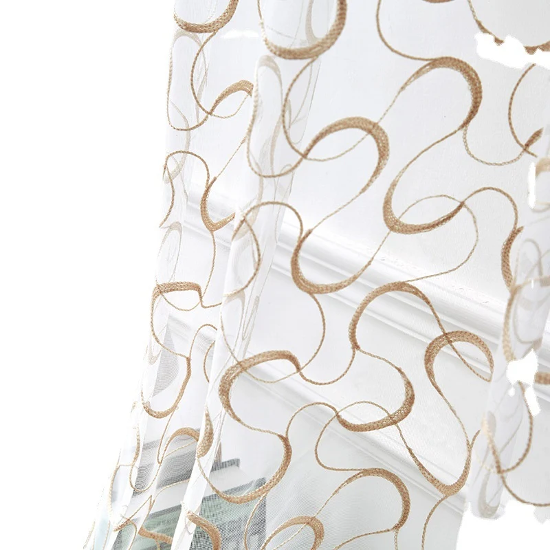 Transparent voile curtain with embroidered golden vine pattern Stornfield