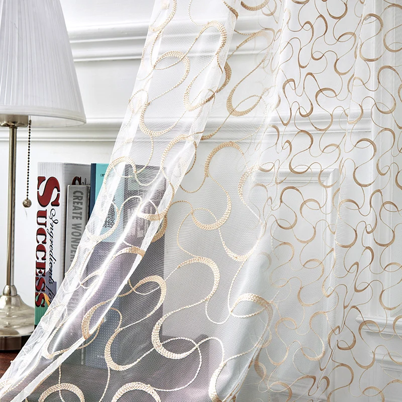 Transparent voile curtain with embroidered golden vine pattern Stornfield