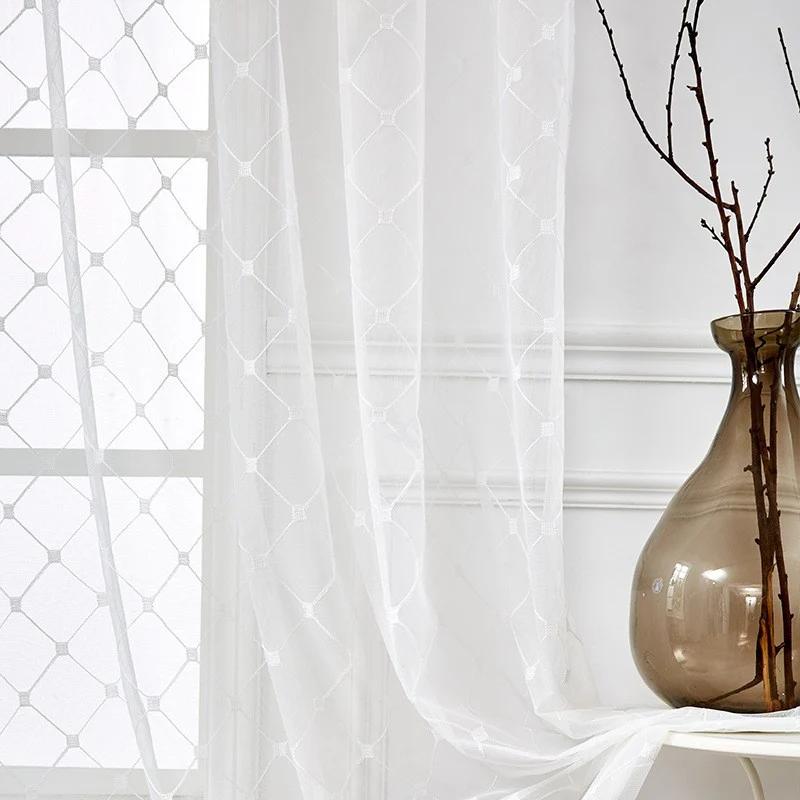 Transparent curtain panel made of fine voile with geometric embroidery Stornfield