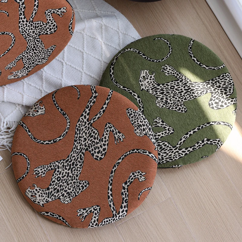 Round seat cushion with jacquard leopard design, thick padding and non-slip underside Stornfield