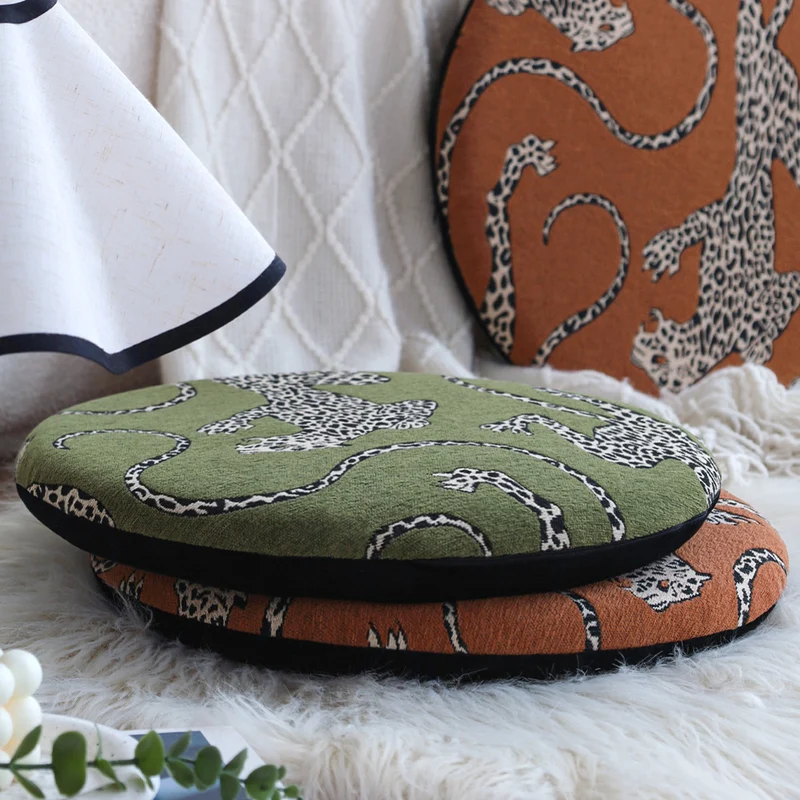 Round seat cushion with jacquard leopard design, thick padding and non-slip underside Stornfield