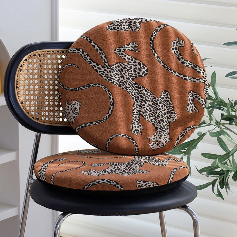 Round seat cushion with jacquard leopard design, thick padding and non-slip underside Stornfield