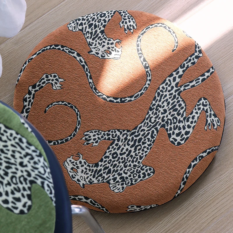 Round seat cushion with jacquard leopard design, thick padding and non-slip underside Stornfield