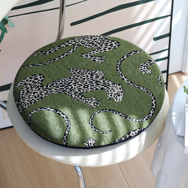 Round seat cushion with jacquard leopard design, thick padding and non-slip underside Stornfield