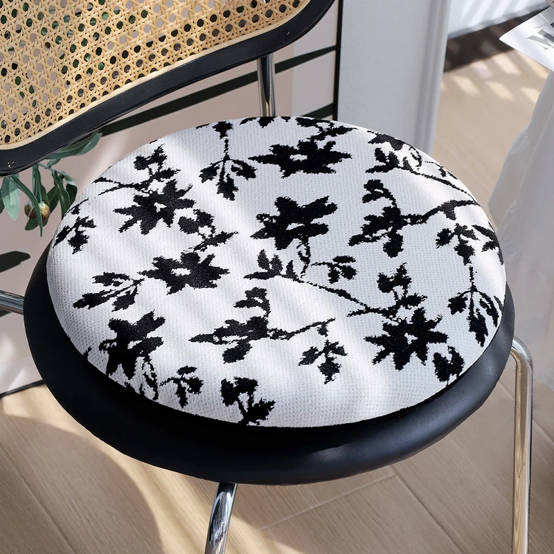 Round seat cushion with quilted padding, floral jacquard cover and anti-slip backing Stornfield