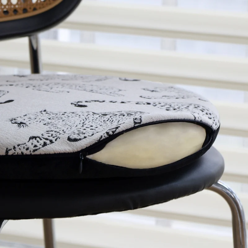Round seat cushion with decorative animal print and non-slip underside Stornfield
