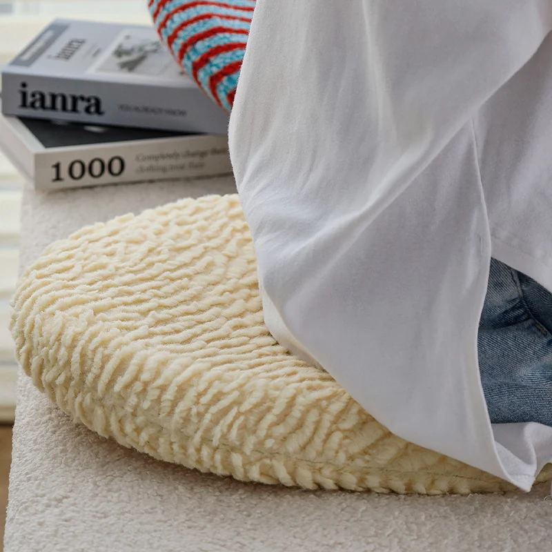 Round padded seat cushion made of soft chenille with striped texture Stornfield
