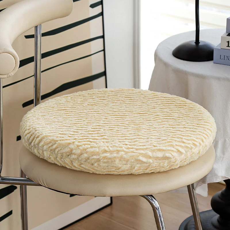 Round padded seat cushion made of soft chenille with striped texture Stornfield