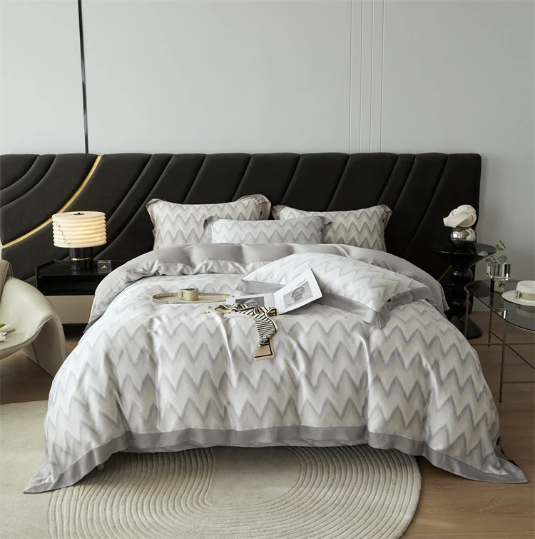 Luxurious satin bedding set with geometric jacquard pattern and satin trim Stornfield