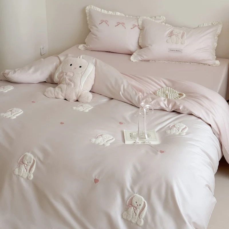 Luxurious cotton satin bedding set with embroidered bunnies and ruffled pillow Stornfield