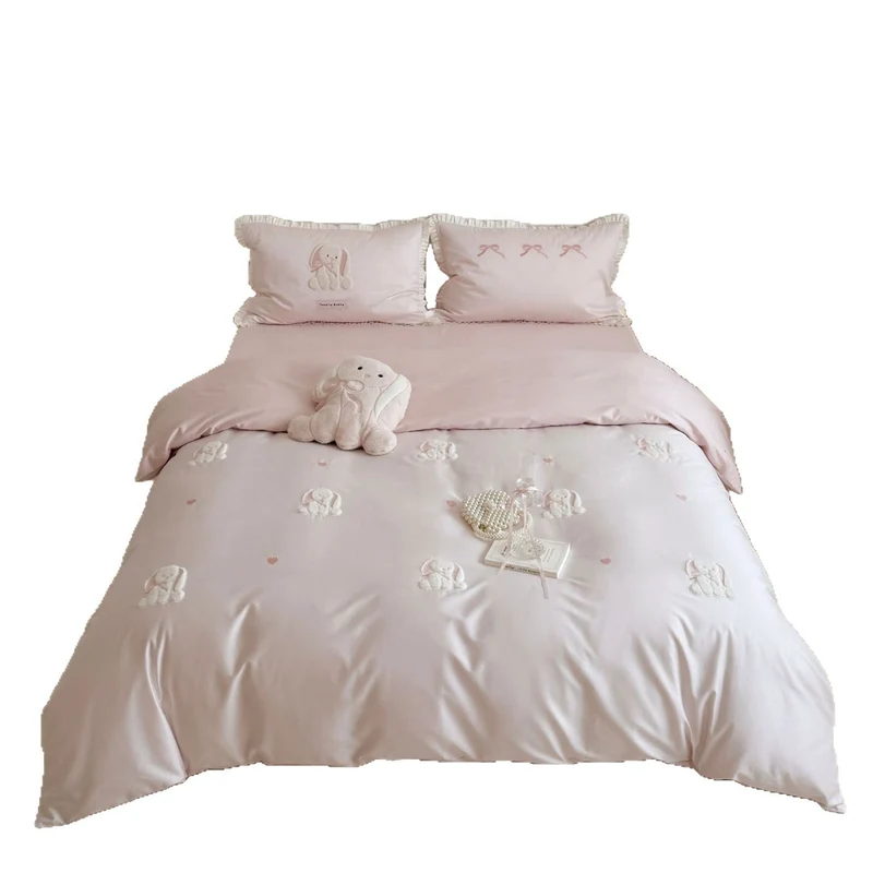 Luxurious cotton satin bedding set with embroidered bunnies and ruffled pillow Stornfield