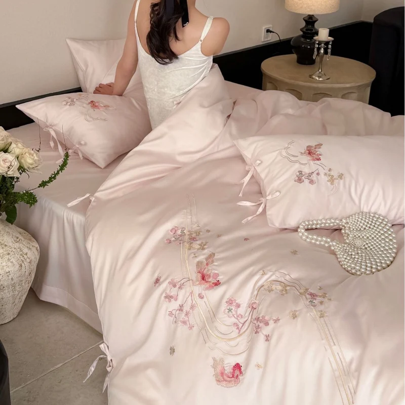 Fine silk satin bedding set with delicate floral embroidery and ties Stornfield