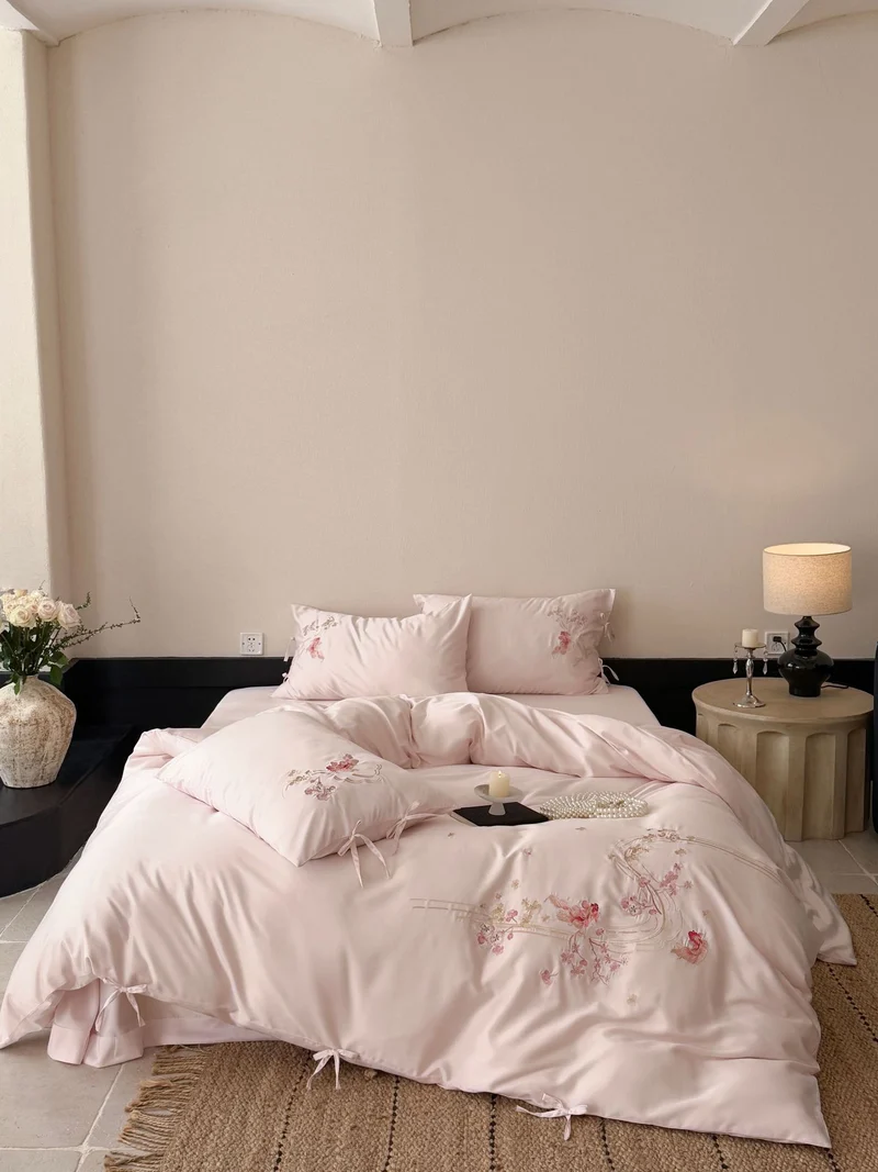 Fine silk satin bedding set with delicate floral embroidery and ties Stornfield