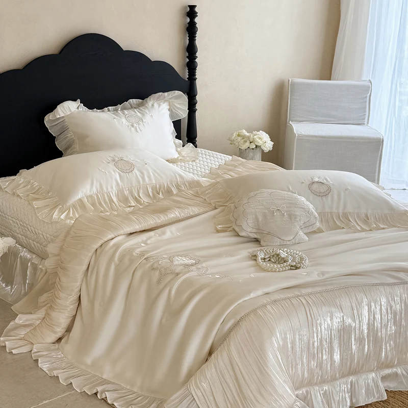 Elegant embroidered satin bedding set with frill pillow and quilted bedspread Stornfield